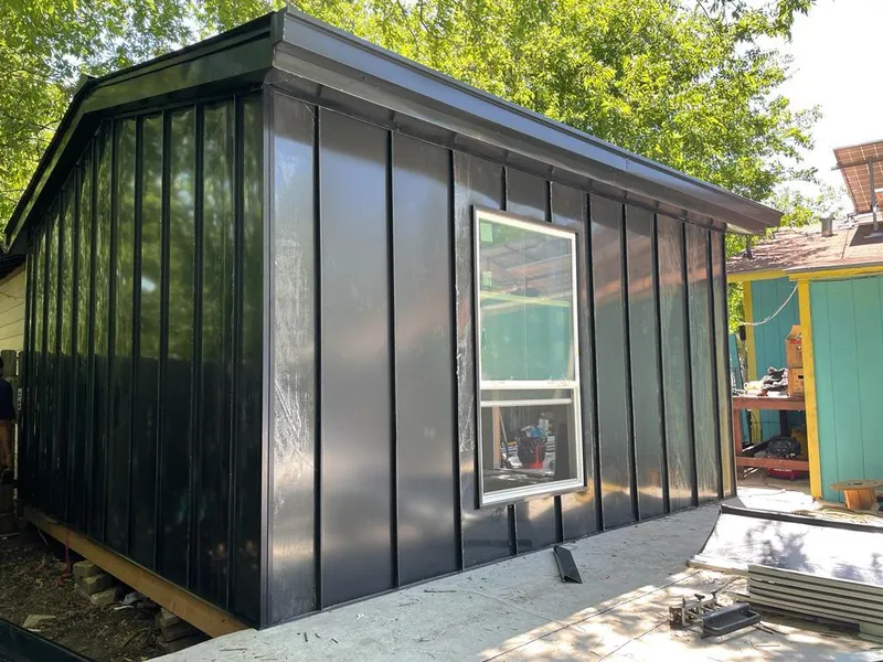 Black standing seam metal wall panels for Roof Inspection in Mulvane